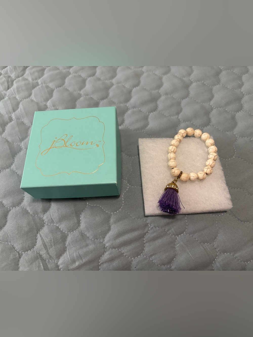 jBloom New Cream Beaded Bracelet with Purple Tassel Charm Inside diameter 2”